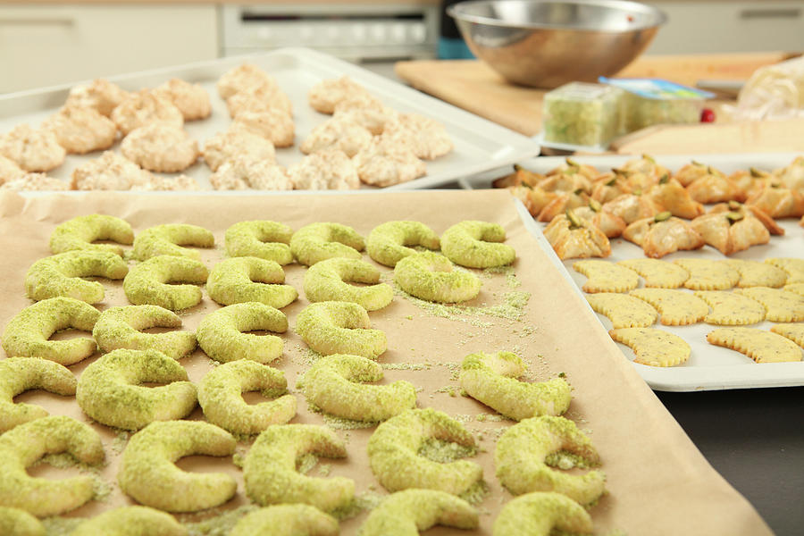 Moon Shaped Cookies On Baking Tray Photograph by Jalag-fotostudio ...