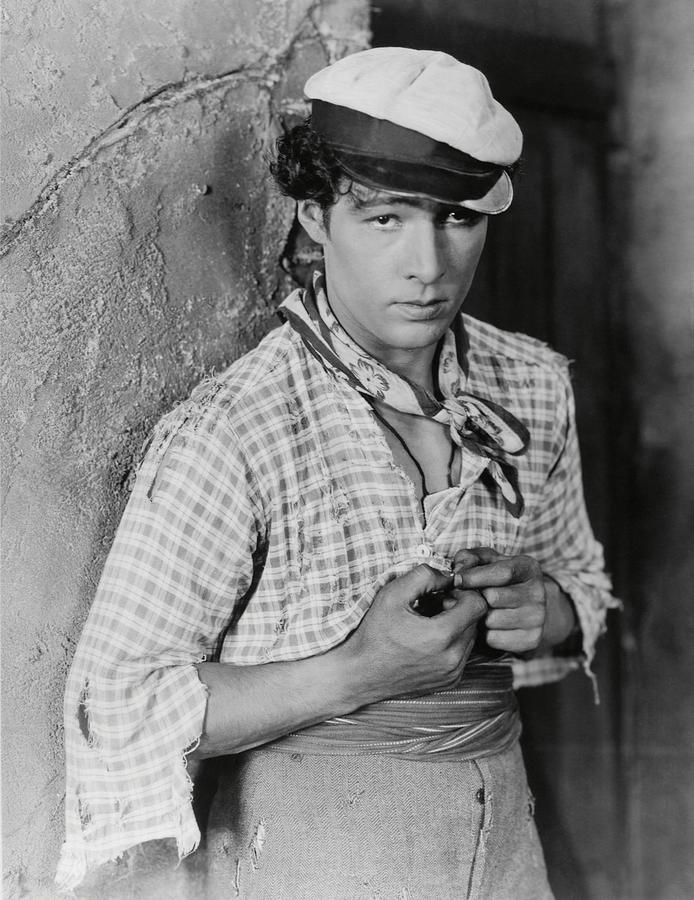 RUDOLPH VALENTINO in BLOOD AND SAND -1922-. #6 Photograph by Album