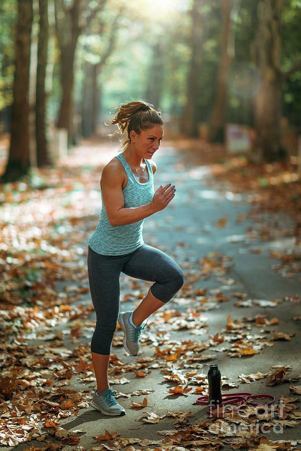Woman Exercising Outdoors #6 Photograph by Microgen Images/science Photo Library