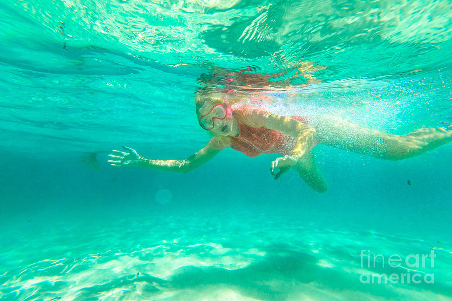 Woman snorkeler in Australia #6 Photograph by Benny Marty