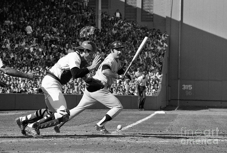 Carlton Fisk Swinging Baseball Bat by Bettmann