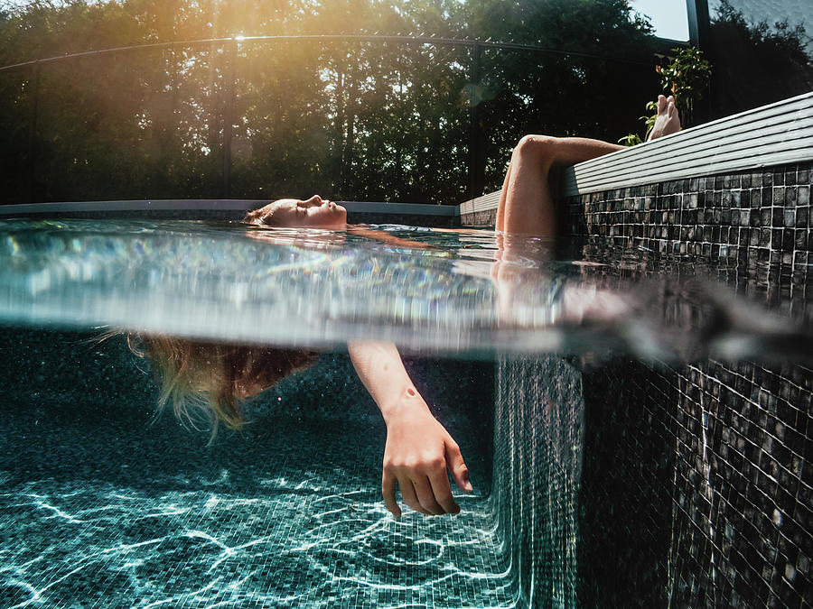 6 Years Old Girl Relaxing And Bathing In A Swimming Pool Photograph by ...