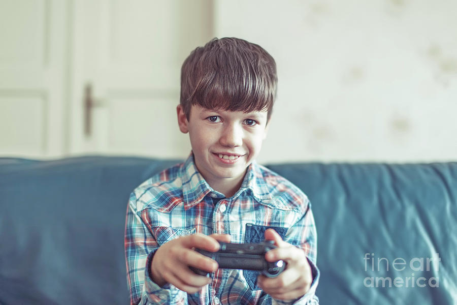 Young Boy Playing Video Game #6 Photograph by Sakkmesterke/science Photo Library