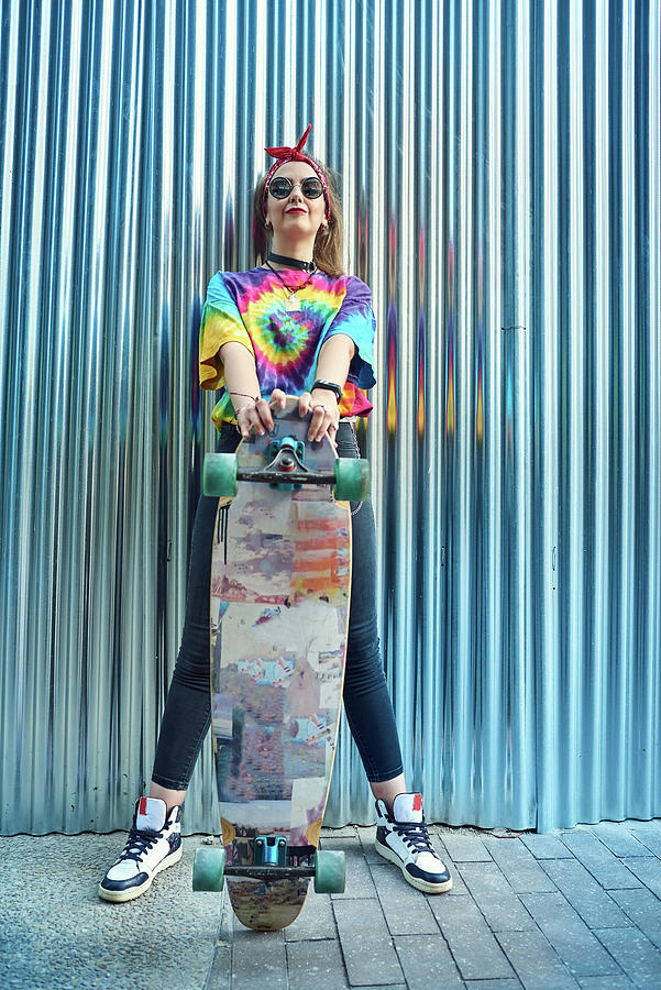Sunset Photograph - Young Woman With Urban Style, She Poses With A Long Board. #6 by Cavan Images