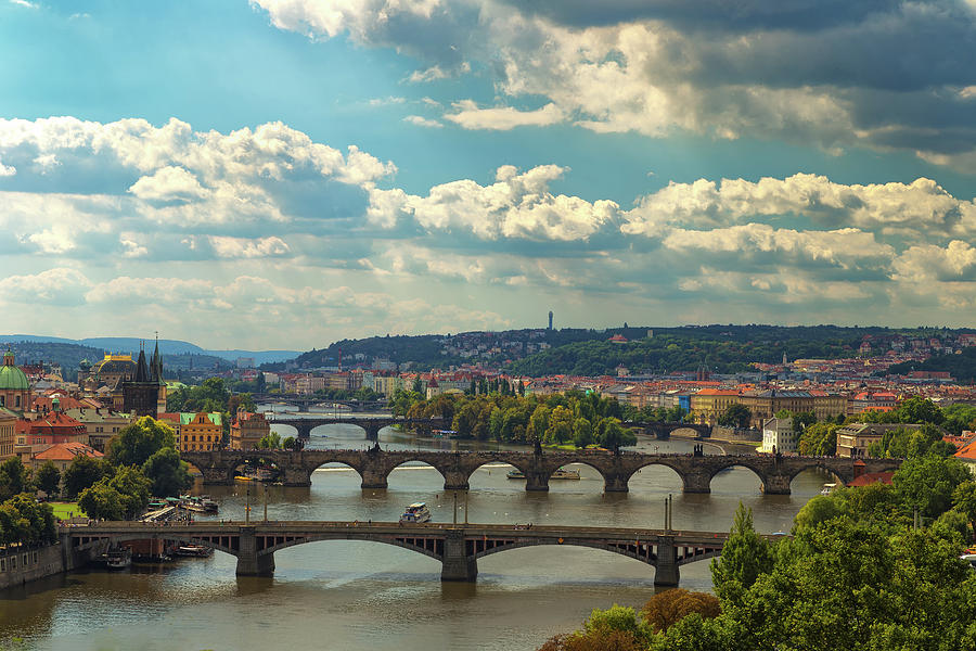 Bridge and rooftops of Prague #7 Photograph by Vivida Photo PC