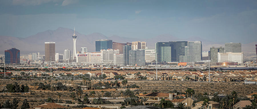 Las vegas city surrounded by red rock mountains and valley of fi #7 Photograph by Alex Grichenko