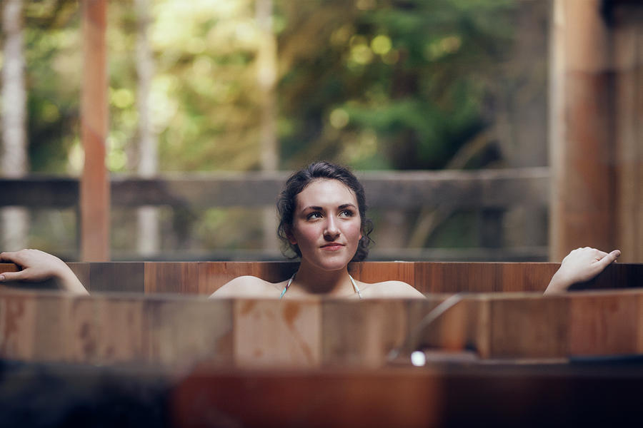 Nature Photograph - Young Smiling Woman At Sauna #7 by Cavan Images