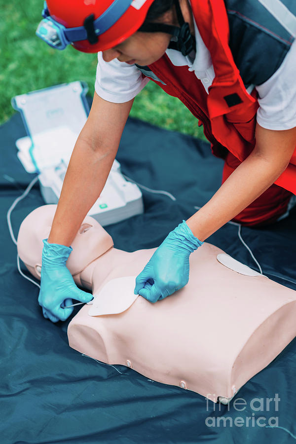Aid Photograph - Defibrillator Training 8 by Microgen Images/science Photo Library Aid Photograph - Defibrillator Training 8 by Microgen Images/science Photo Library