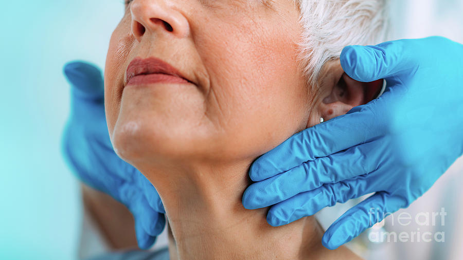 Doctor Examining A Senior Womans Neck #8 Photograph by Microgen Images/science Photo Library
