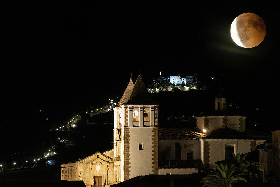 Double Exposures Of The Red Blood Moon Over The Caceres Old Town Photograph