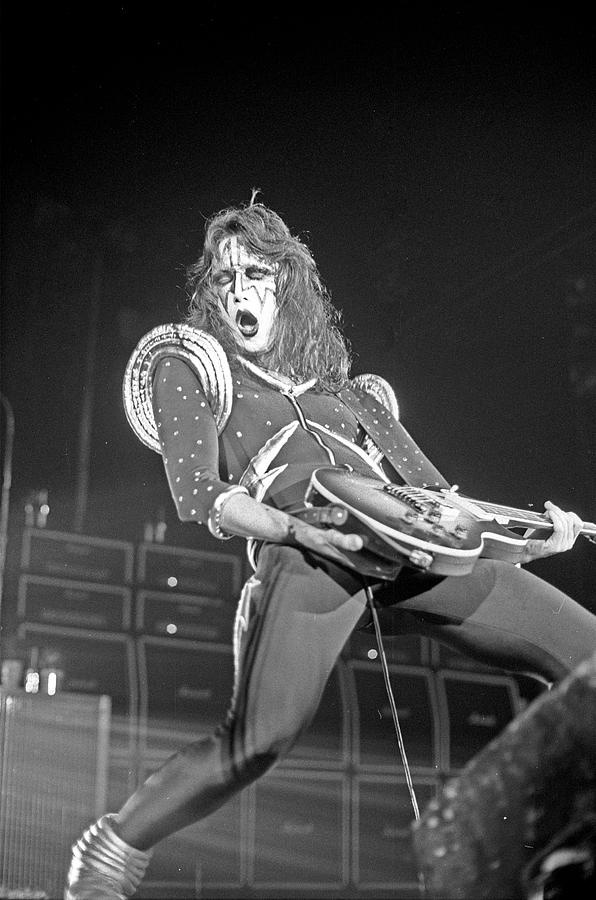 Black And White Photograph - Kiss Performing #8 by Michael Ochs Archives