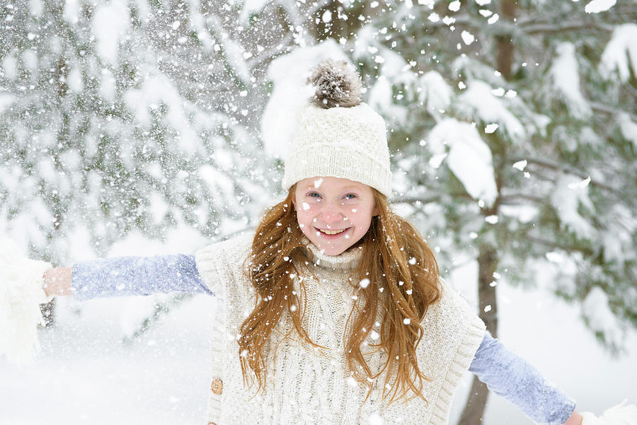 Little Red Haired Girl Playing In The Snow Photograph by Cavan Images ...