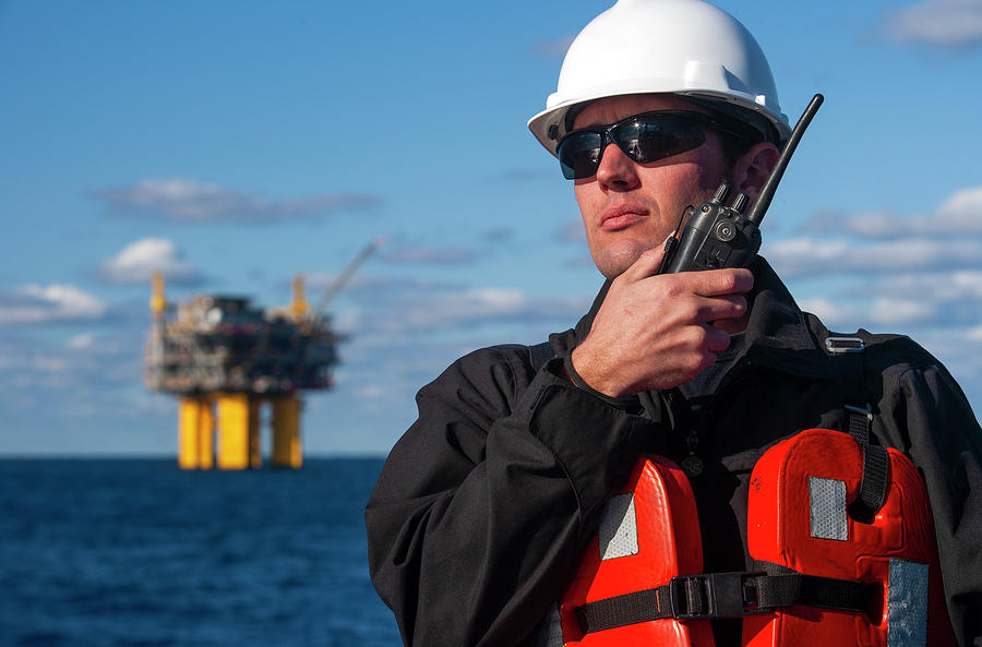 Offshore Energy Production With Person On Ship Photograph By Cavan 