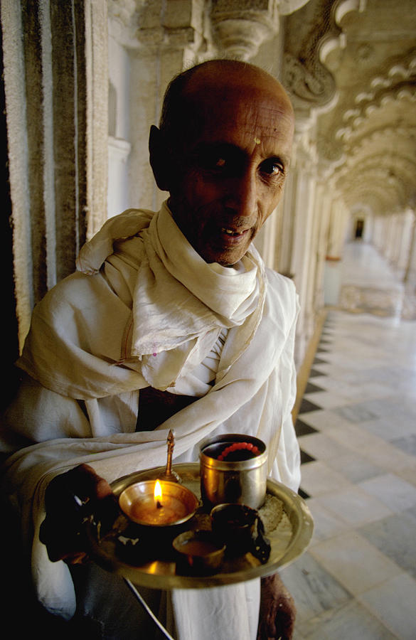 A Jain Monk  Holds A Votive Candle Photograph