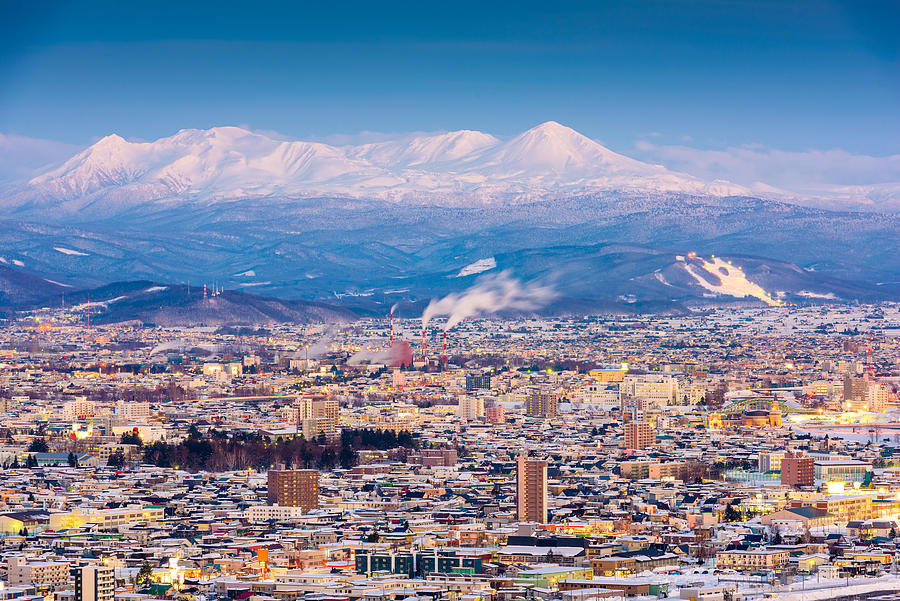 Mountain Photograph - Asahikawa, Japan Winter Cityscape #9 by Sean Pavone