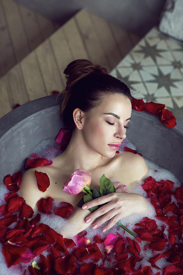 Beautiful Girl Lying In A Stone Bath With Rose Petals And Foam #9  Photograph by Elena Saulich - Pixels