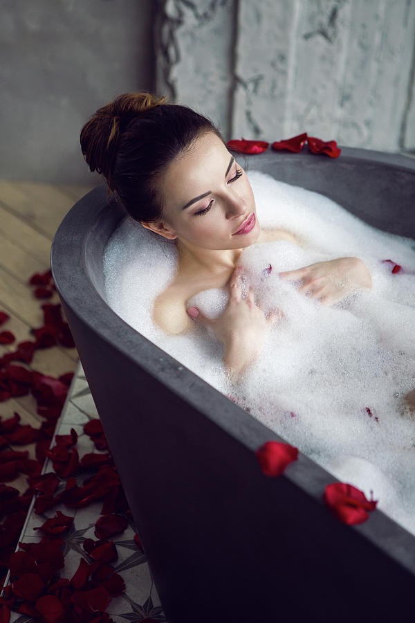 Sexy Beautiful Woman Lies In Stone Bath With Foam Photograph