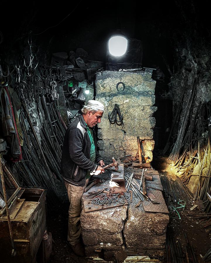 Man Photograph - The Traditional Blacksmithing Profession In The City Of Mosul #9 by Bashar Alsofey
