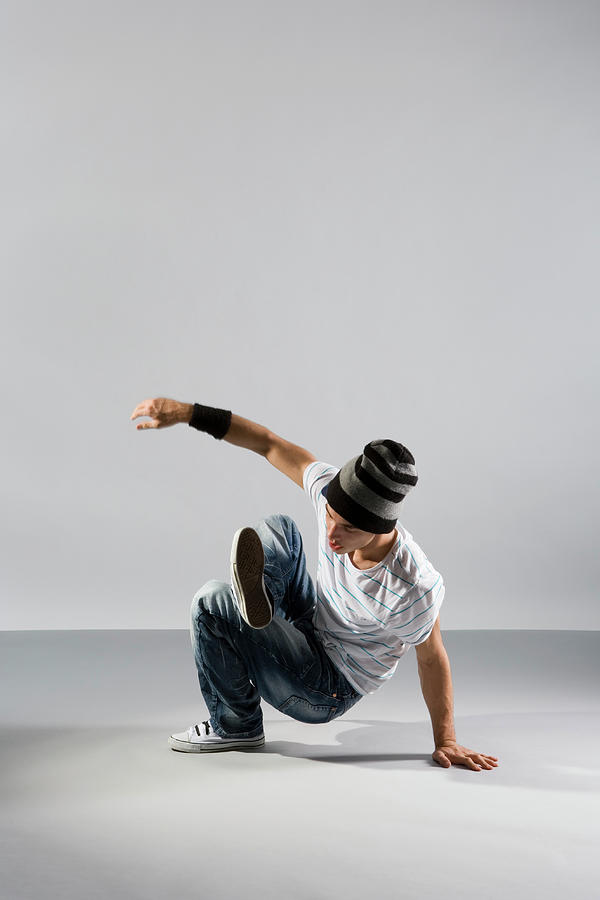 A B-boy Doing A  Breakdance Move Photograph by Halfdark