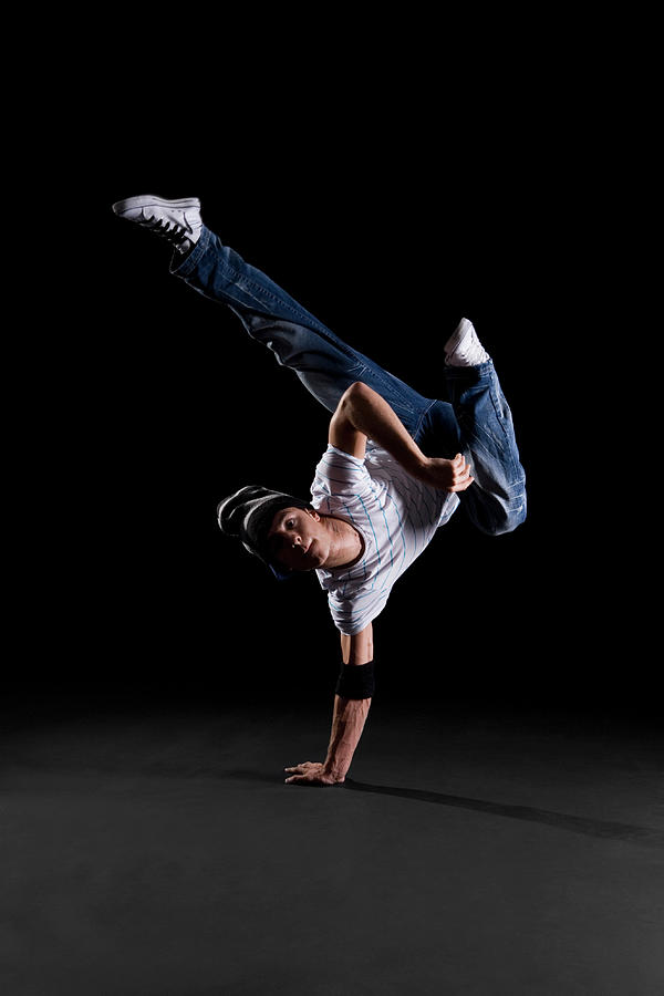 A B-boy Doing A K-kick  Breakdance Move Photograph by Halfdark