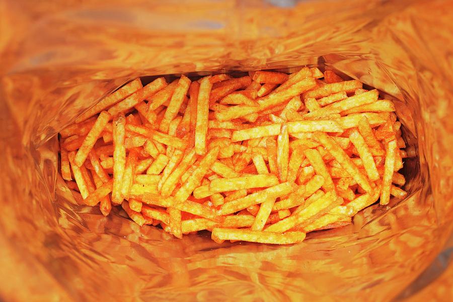 A Bag Of Potato Crisp Sticks seen From Above Photograph by Krger & Gross