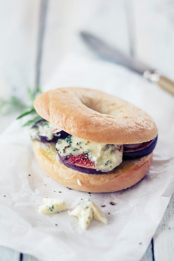 A Bagel With Blue Cheese And Figs Photograph by Jan Wischnewski