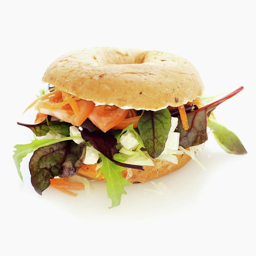 A Bagel With Feta Cheese, Lettuce, Tomato And Carrot Photograph by Martin Dyrlv