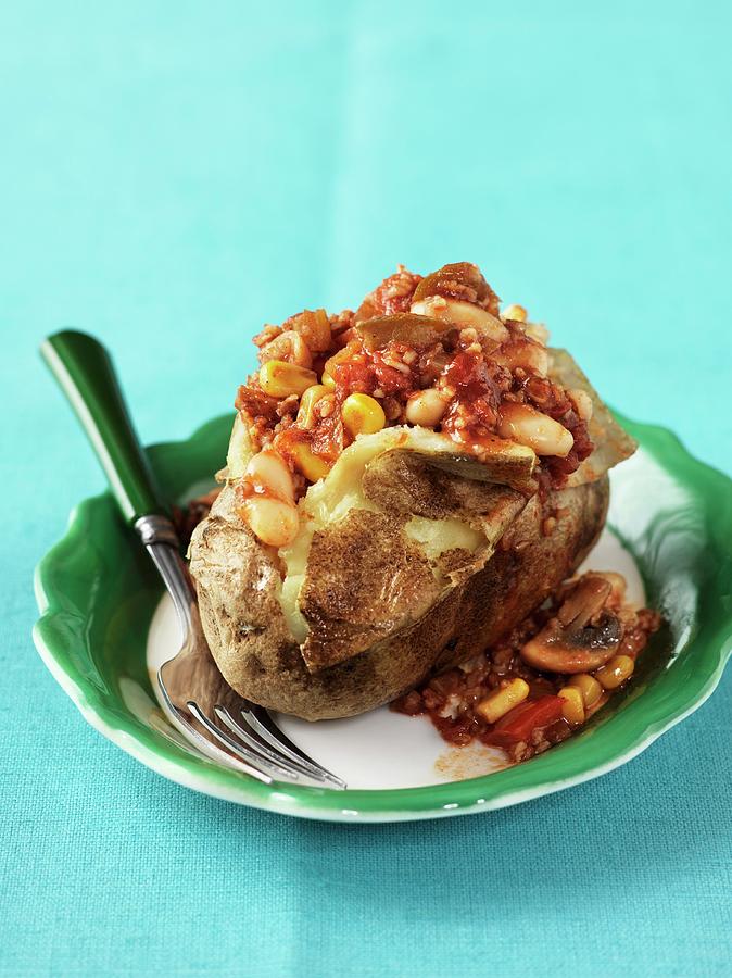 A Baked Potato Filled With Chilli Photograph by Jim Norton