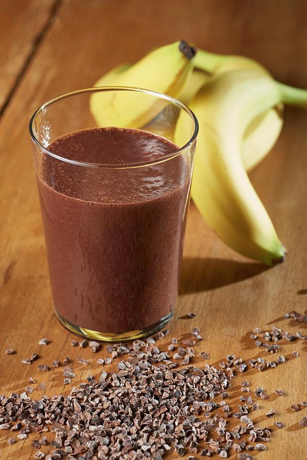 A Banana And Chocolate Smoothie With Ingredients Photograph by Studio R. Schmitz