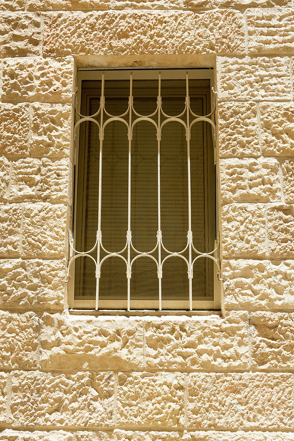 A barred window in the Jewish Quarter of the Old City, Jerusalem Photograph by William Kuta