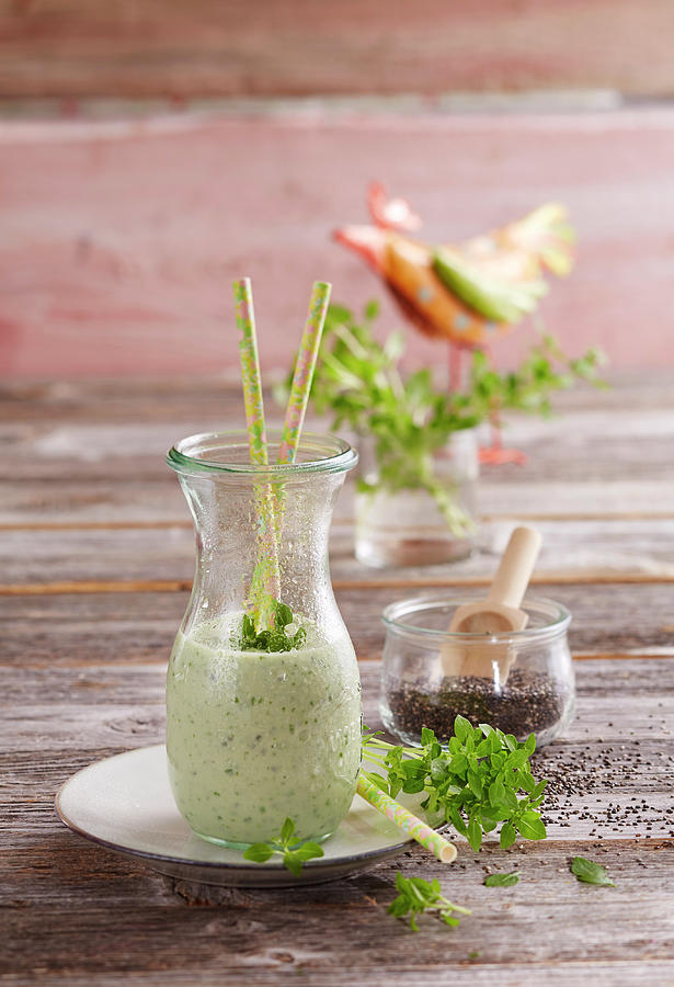 A Basil Smoothie With Chia Seeds, Yoghurt, Banana, Milk And Lime Photograph by Teubner Foodfoto