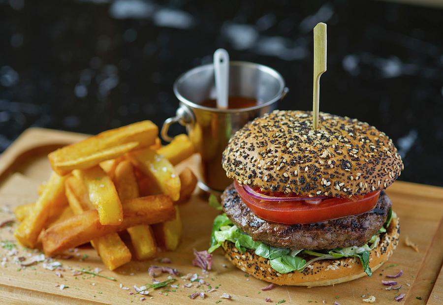 Bread Photograph - A Beefburger With Chips by Tim Winter