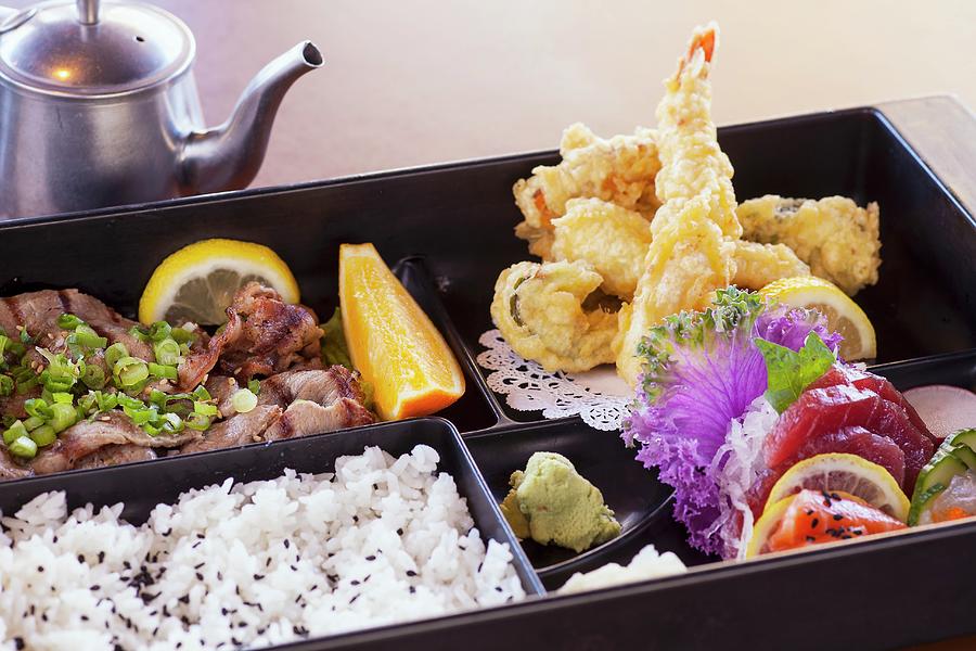 A Bento Box With Amiyaki Beef, Shrimp And Vegetable Tempura, Sashimi And Rice japan Photograph by Chuck Place