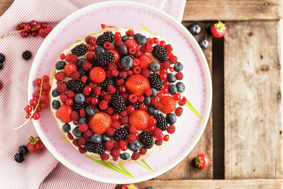 A Berry Nest With Lemon Cream seen From Above Photograph by Nadja Walger