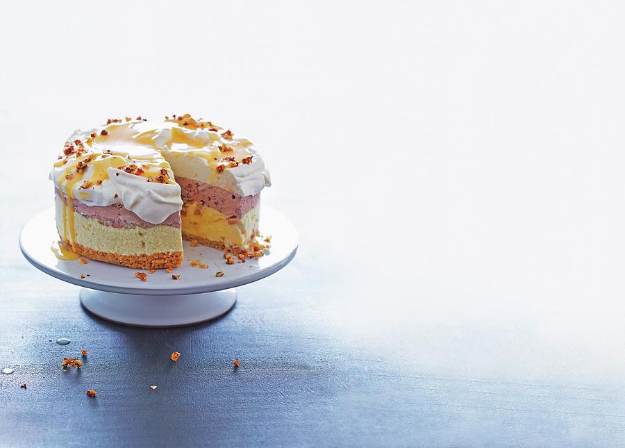 A Bi-coloured Ice Cream Cake With A Biscuit Base, Egg Liqueur And Roasted Hazelnuts Photograph by Jalag / Julia Hoersch