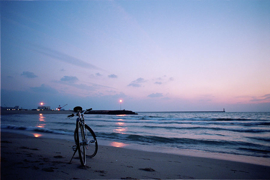 A Bike On Evening Beach Photograph by Breeze.kaze