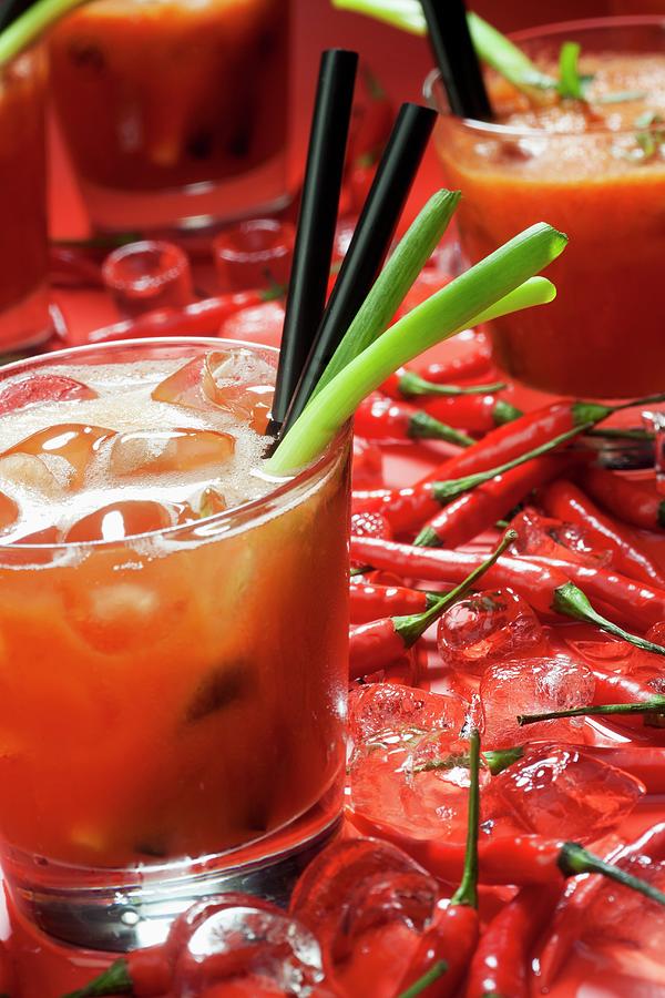 https://images.fineartamerica.com/images/artworkimages/mediumlarge/2/a-bloody-mary-fresh-chilli-peppers-and-ice-cubes-michael-van-emde-boas.jpg