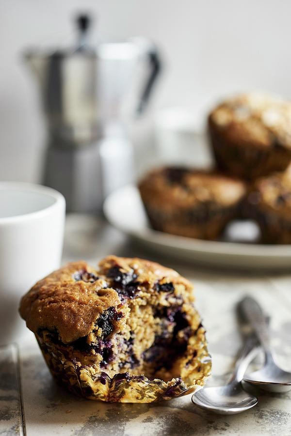 A Blueberry Muffin With A Bite Taken Out close Up Photograph by Ulrike Emmert