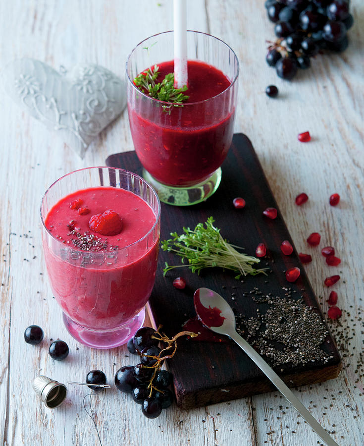 A Blueberry Smoothie With Grapes And Pomegranate Seeds Photograph by Udo Einenkel