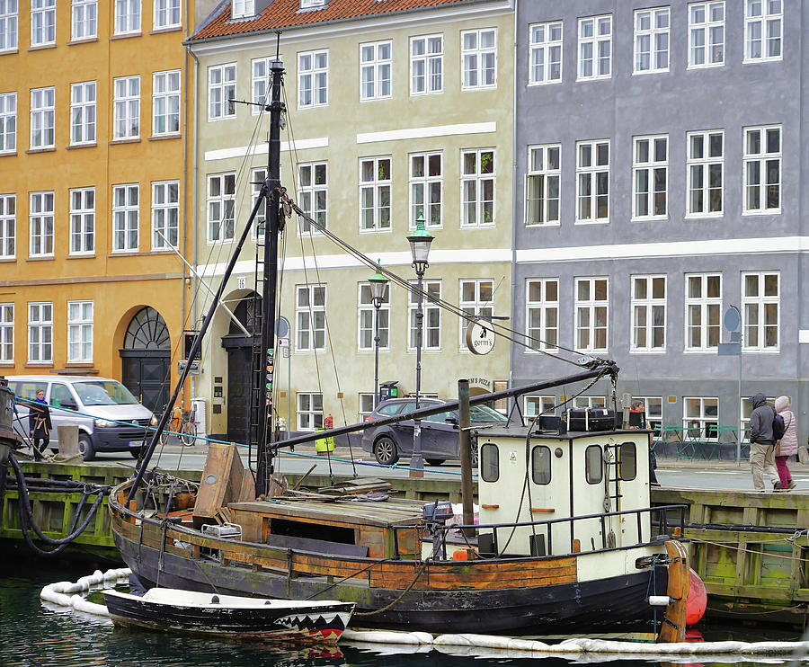A Boat Docked In The Canal In Nyhavn Photograph by Rick Rosenshein
