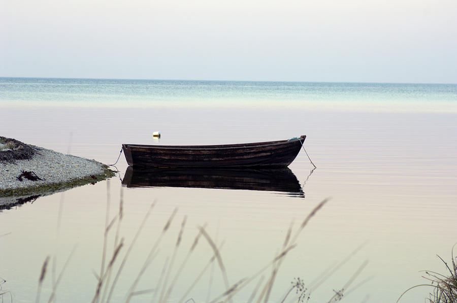 A Boat On Calm Water Photograph by Johner Royalty-free
