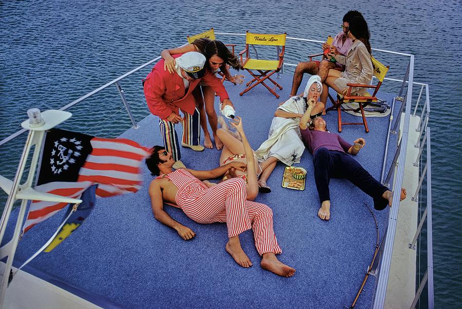 A Boat Party At Sea Photograph by Douglas Mesney