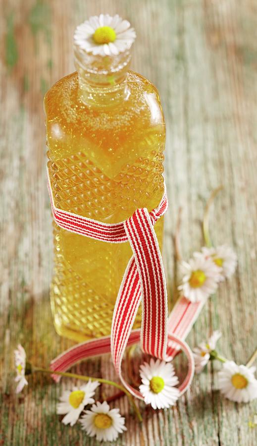 A Bottle Of Daisy Syrup Photograph by Teubner Foodfoto