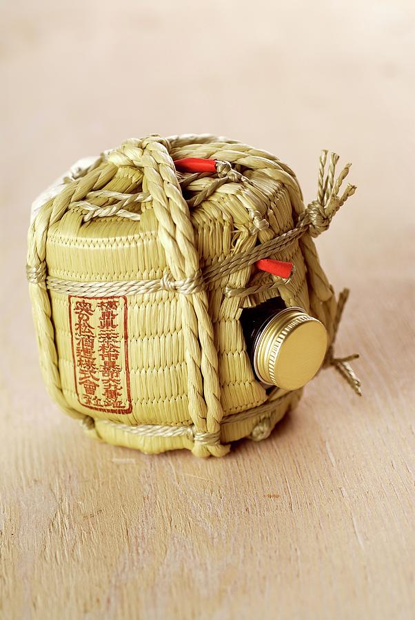 A Bottle Of Japanese Sake Photograph by Franco Pizzochero