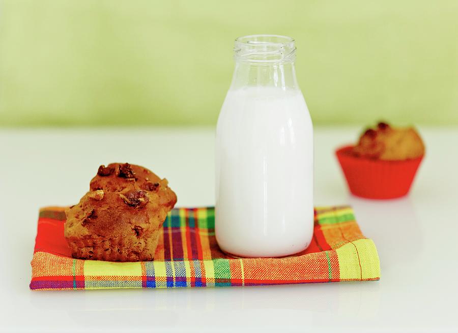 A Bottle Of Milk And A Banana And Walnut Muffin Photograph by Hannah Elizabeth