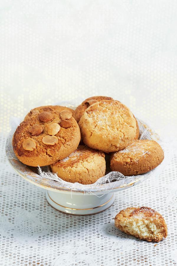 A Bowl Of Almond Biscuits Photograph by Miriam Rapado