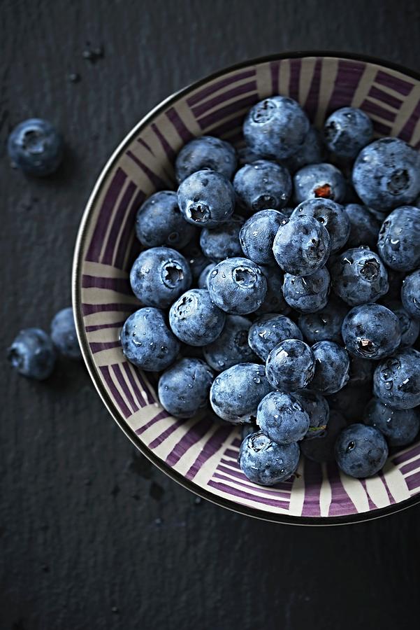 A Bowl Of Blueberries close Up Photograph by B.&.e.dudzinski