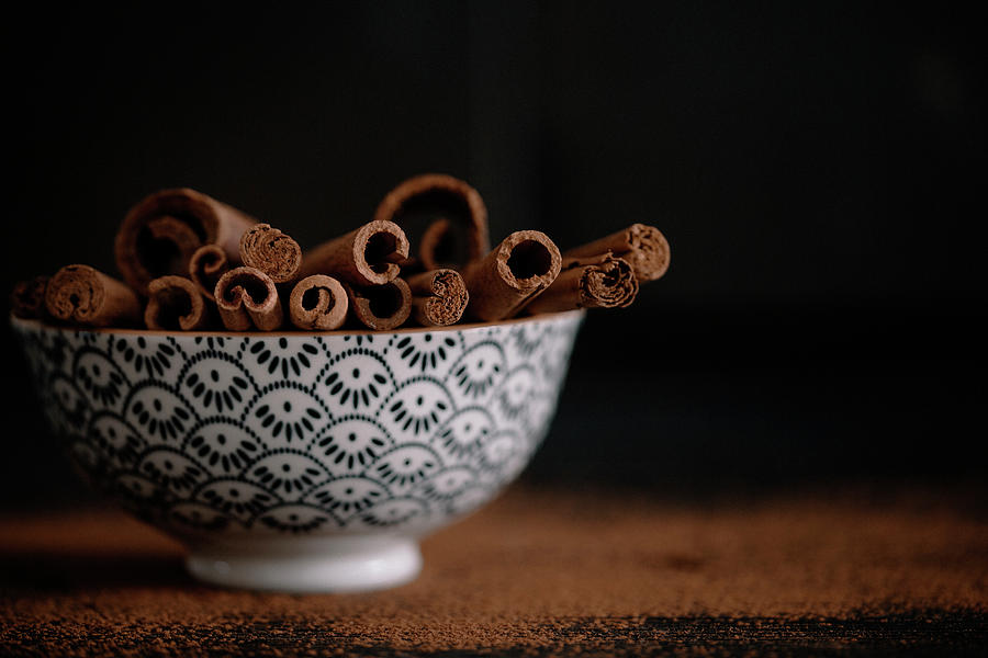 A Bowl Of Cinnamon Sticks Photograph by Syl Loves