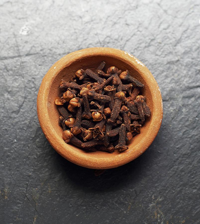 A Bowl Of Cloves Photograph by Jack Fillery