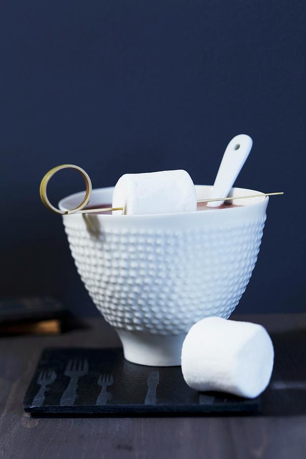 A Bowl Of Cocoa With Marshmallows On A Bamboo Stick Photograph by Taube, Franziska